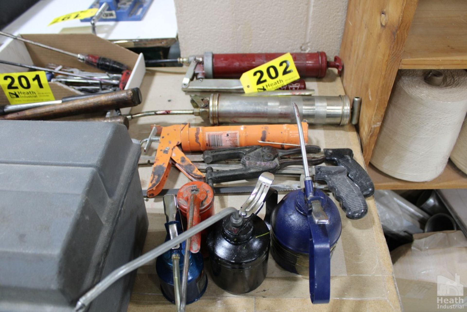 GREASE GUNS, HAND SAWS AND OIL CANS