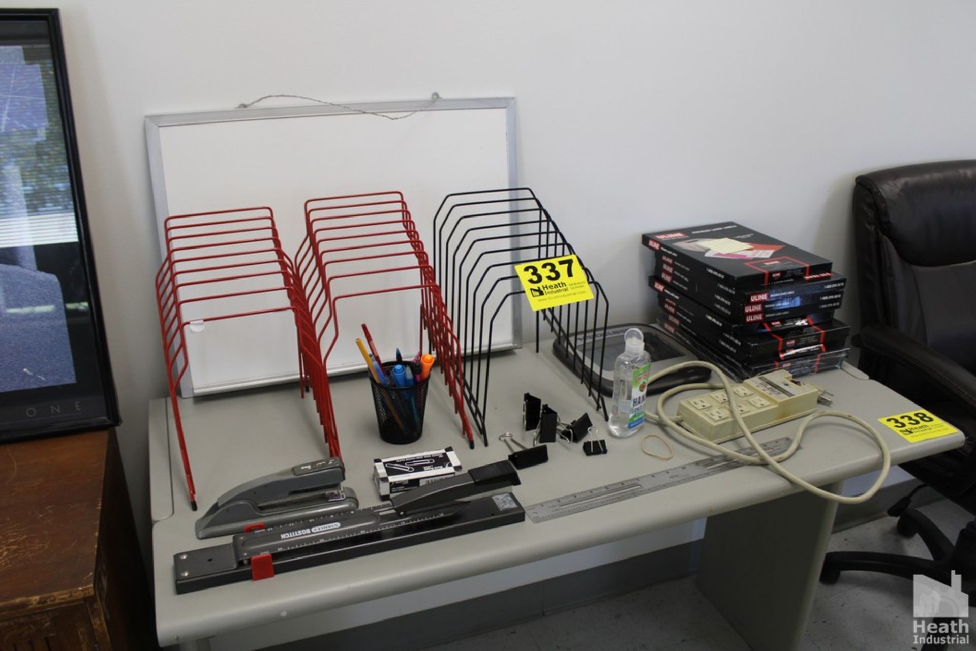 ASSORTED OFFICE SUPPLIES ON TOP OF TABLE