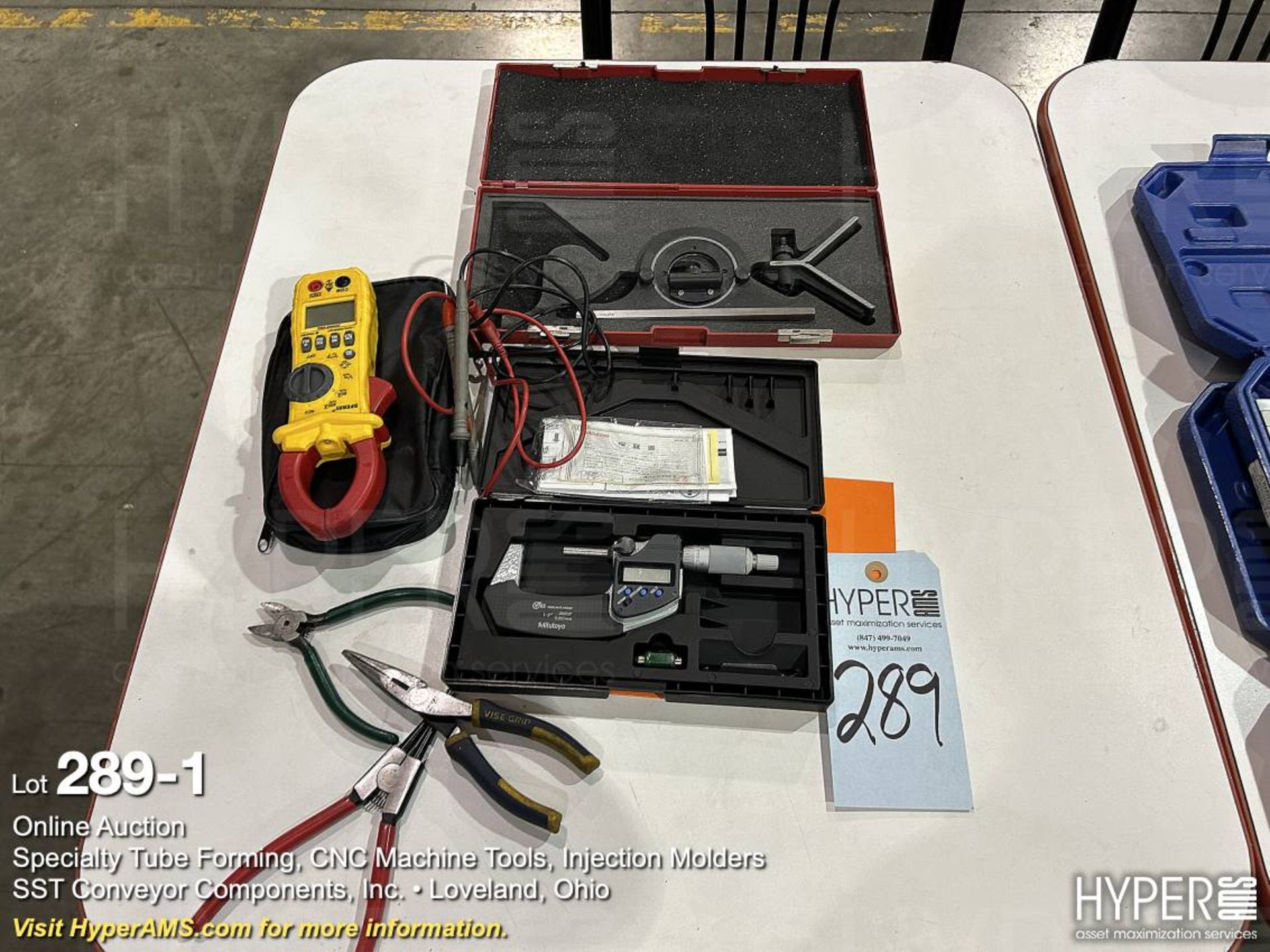 Mitutoyo 1"-2" caliper, voltmeter, and tools