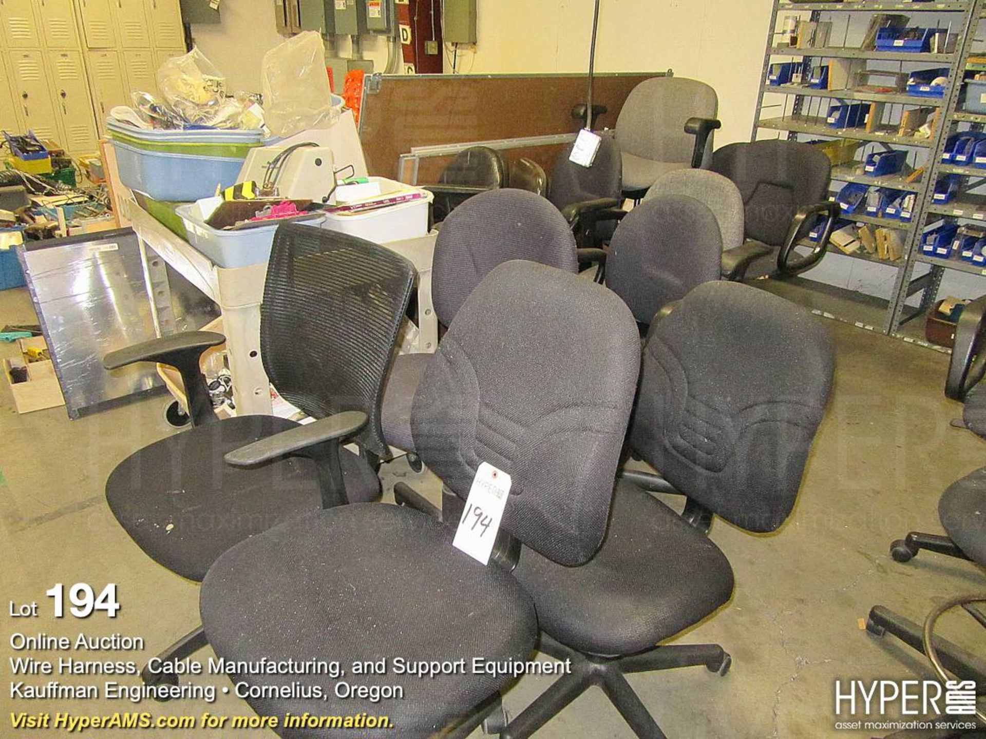 Assorted office chairs on casters.
