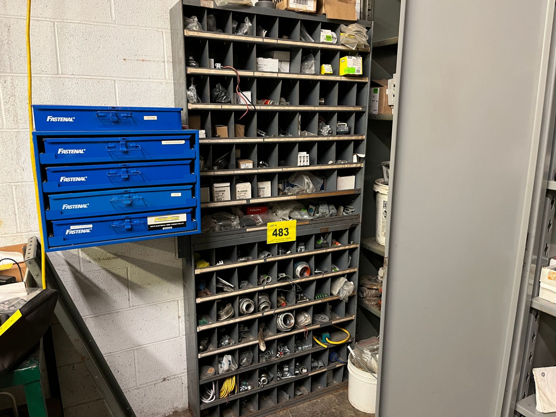LOT OF (2) APPROX. 60-SLOT PIGEON HOLE CABINETS W/ ELECTRICAL PARTS (MAINTENANCE AREA PMB)