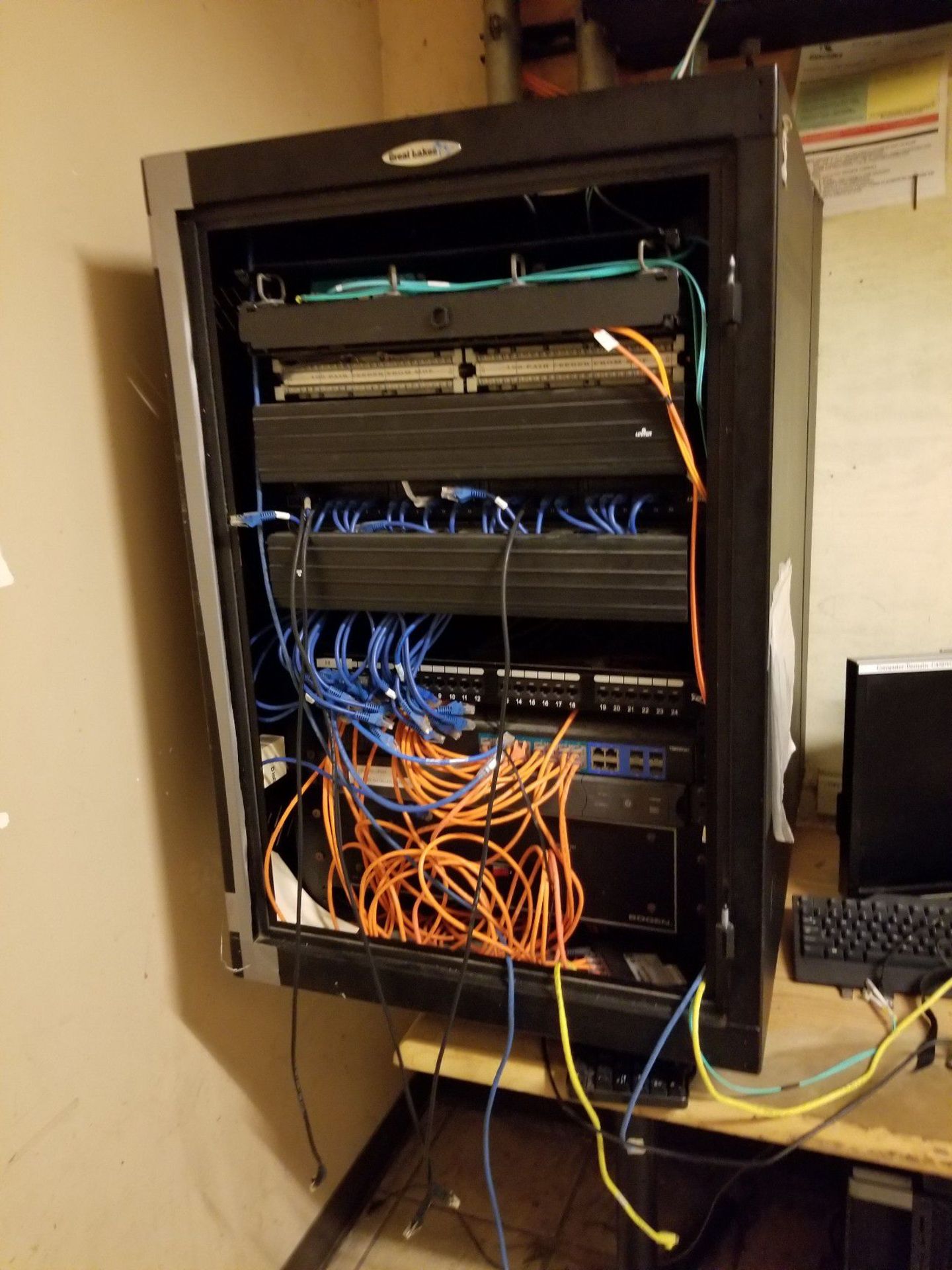 SERVER RACK W/ SWITCHES, ELECTRICAL COMMUNICATION SYSTEMS, MONITORS, COMPUTER, DESK, ETC. (