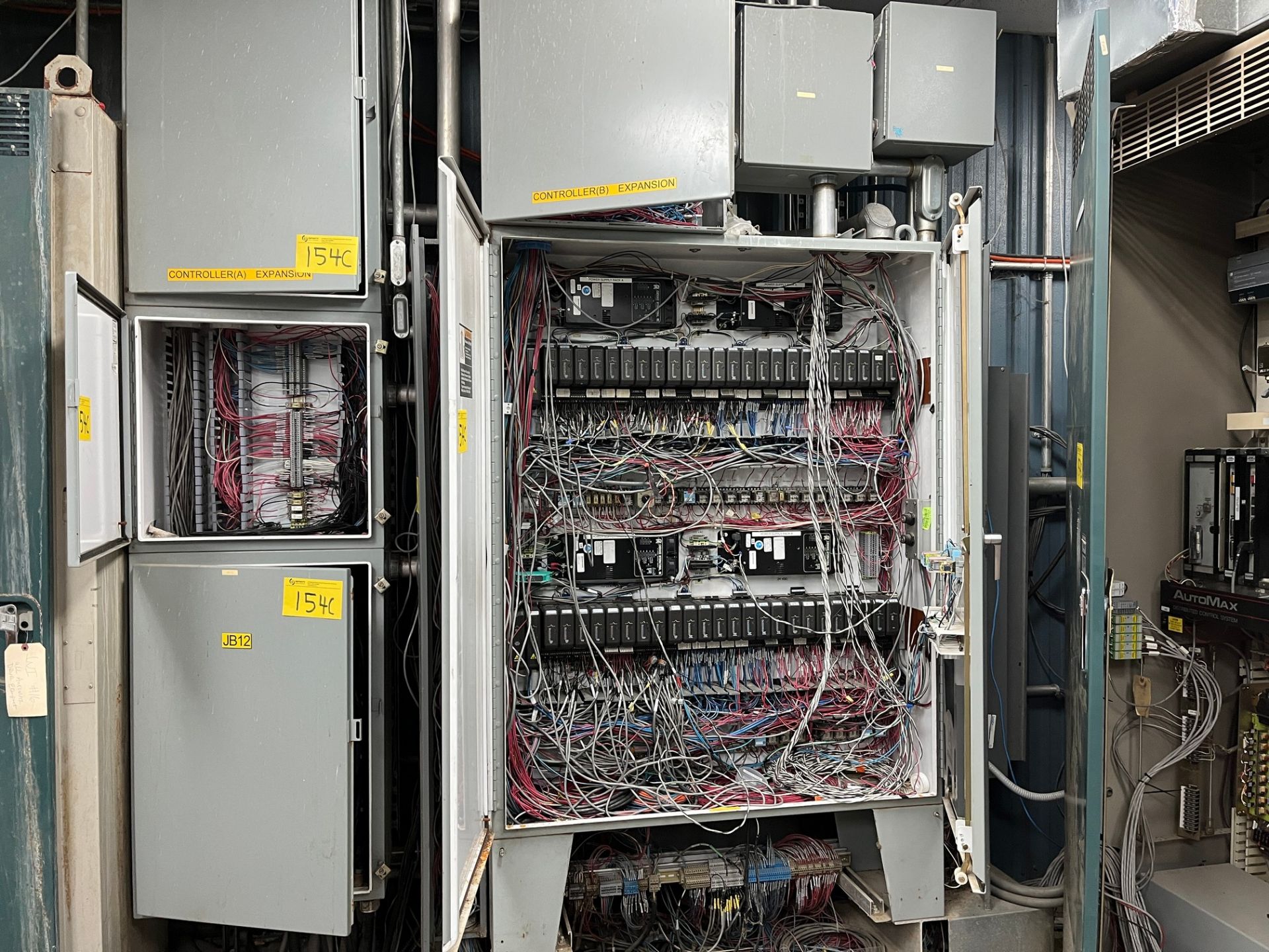 LOT OF (8) CONTROL CABINETS W/ WIRE AND ELECTRICAL BOXES WITHIN W/ DELTA V PAPER MACHINE UNIT (PM