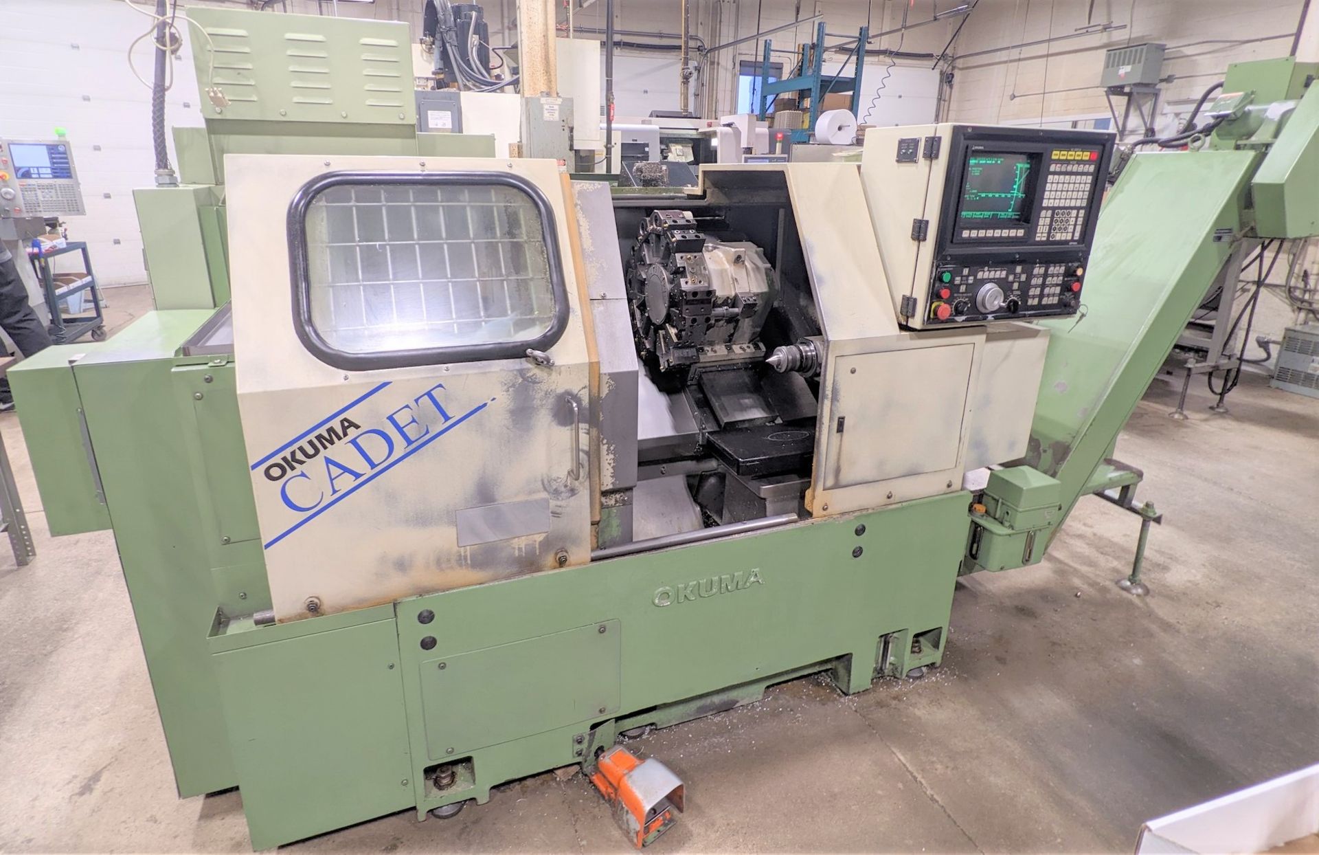 OKUMA CADET LNC8 CNC TURNING CENTER, CNC CONTROL, 10” 3-JAW CHUCK, TAILSTOCK, 12-STATION TURRET, 9.