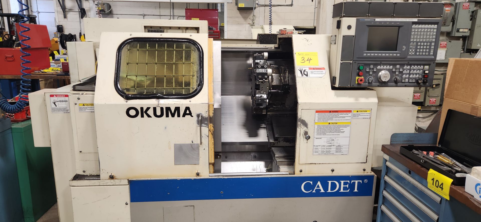 OKUMA CADET LNC8 CNC TURNING CENTER, OSP700M CNC CONTROL, 10” 3-JAW CHUCK, TAILSTOCK, 12-STATION - Image 8 of 13