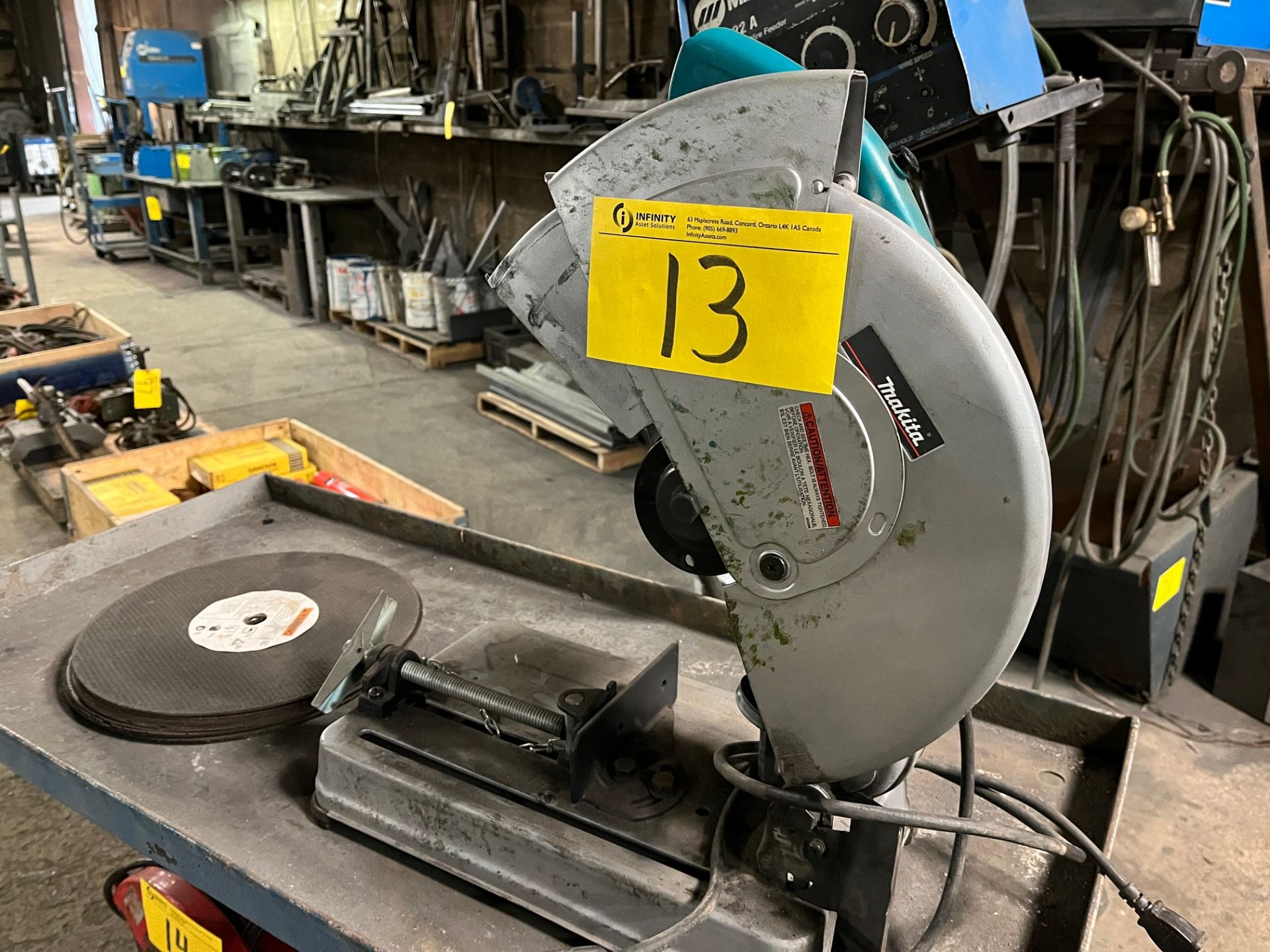 MAKITA 14" CHOP SAW W/ CUTTING WHEELS