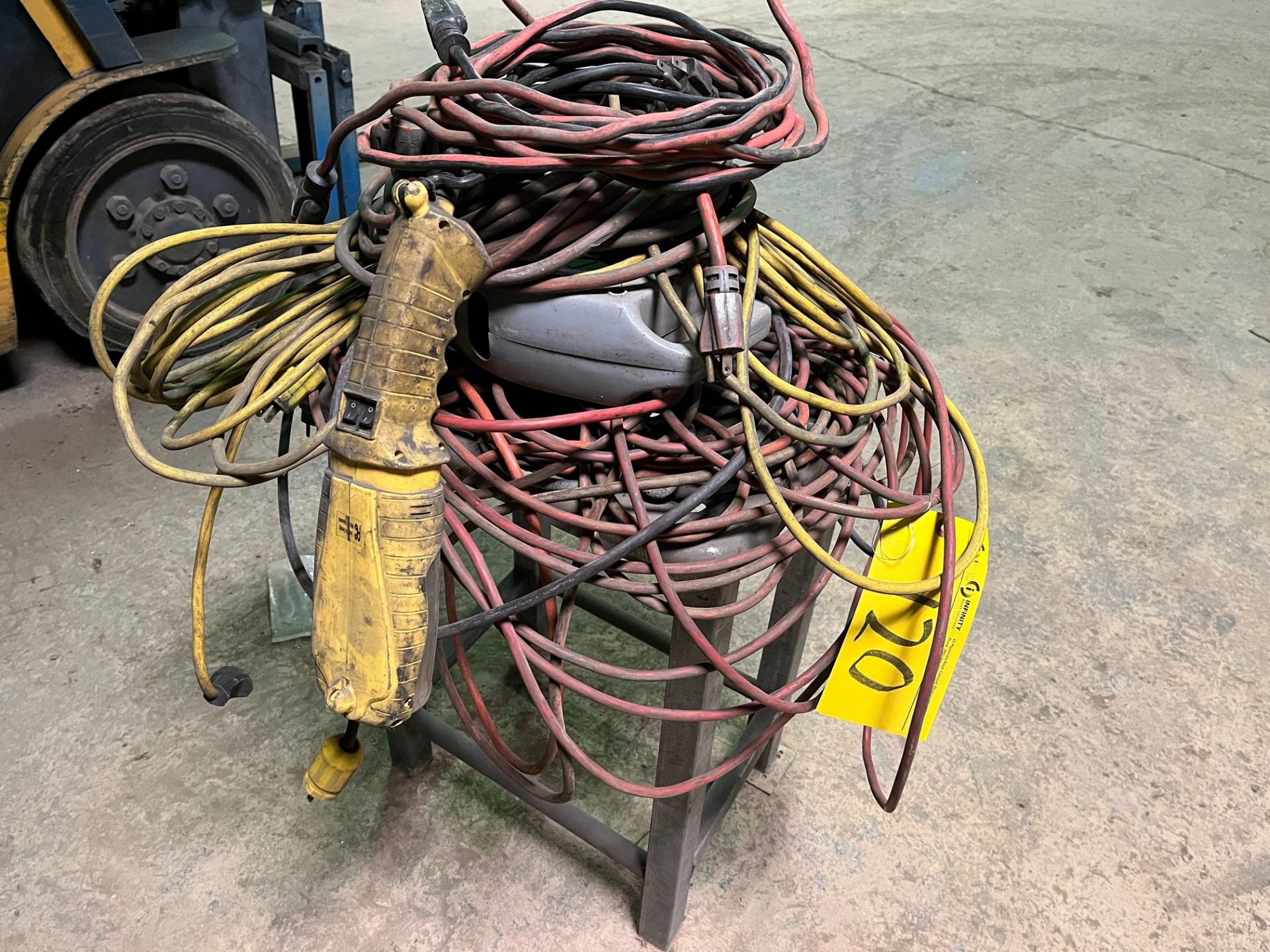 LOT OF EXTENSION CORDS AND SMALL METAL STAND