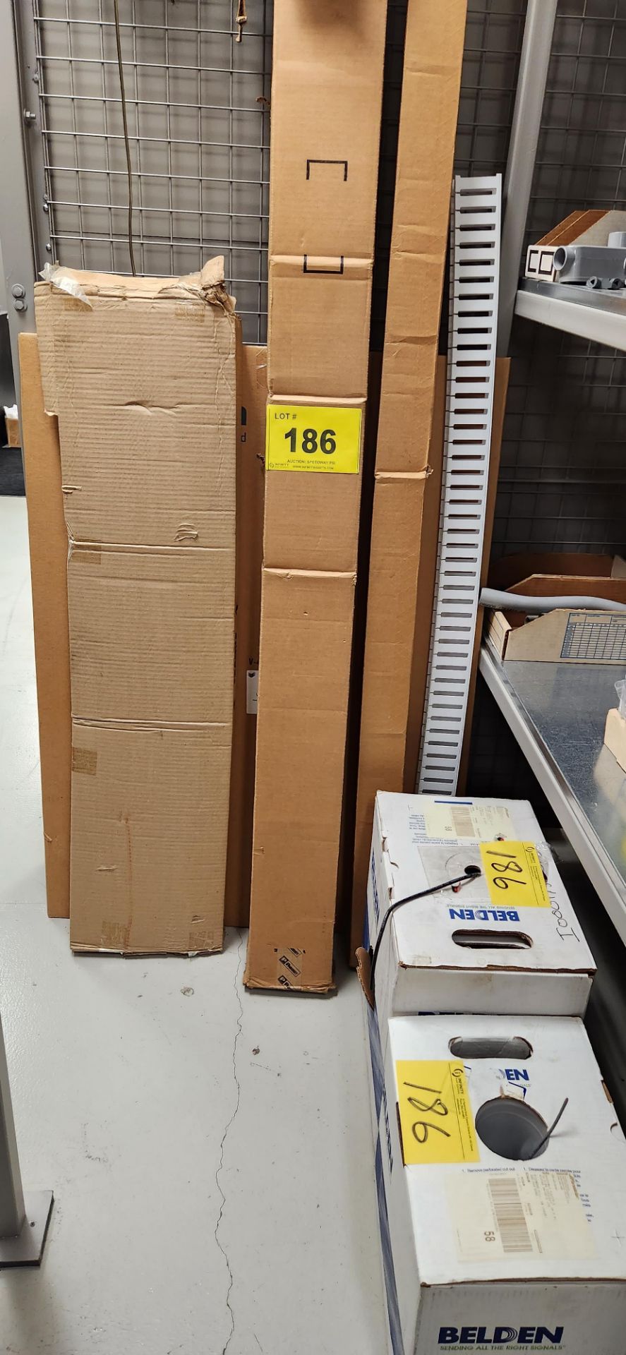 LOT OF ELECTRICAL CABLES IN BOXES AND PANDUIT RACKS IN CARTONS (TOP SHELF / (1) SECTION AND FLOOR