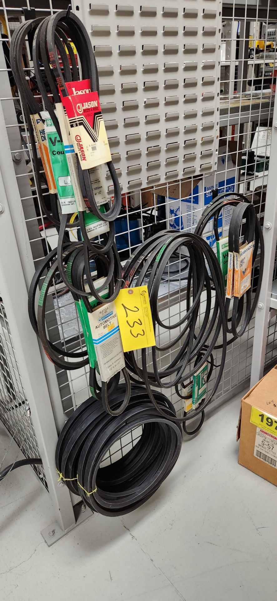 LOT OF HANGING V BELTS