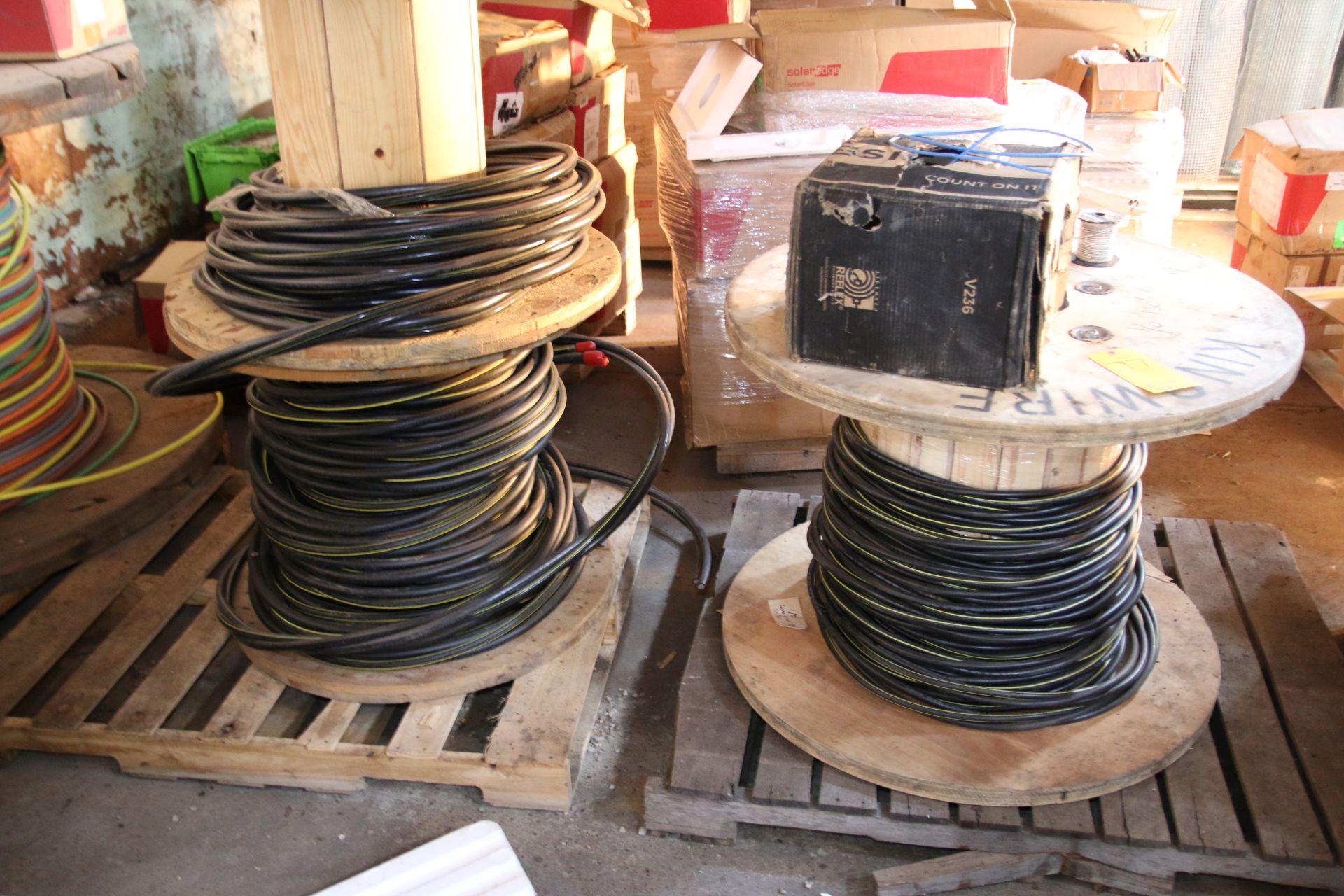 (4) Large Spools of Cable and (1) Box of Wiring