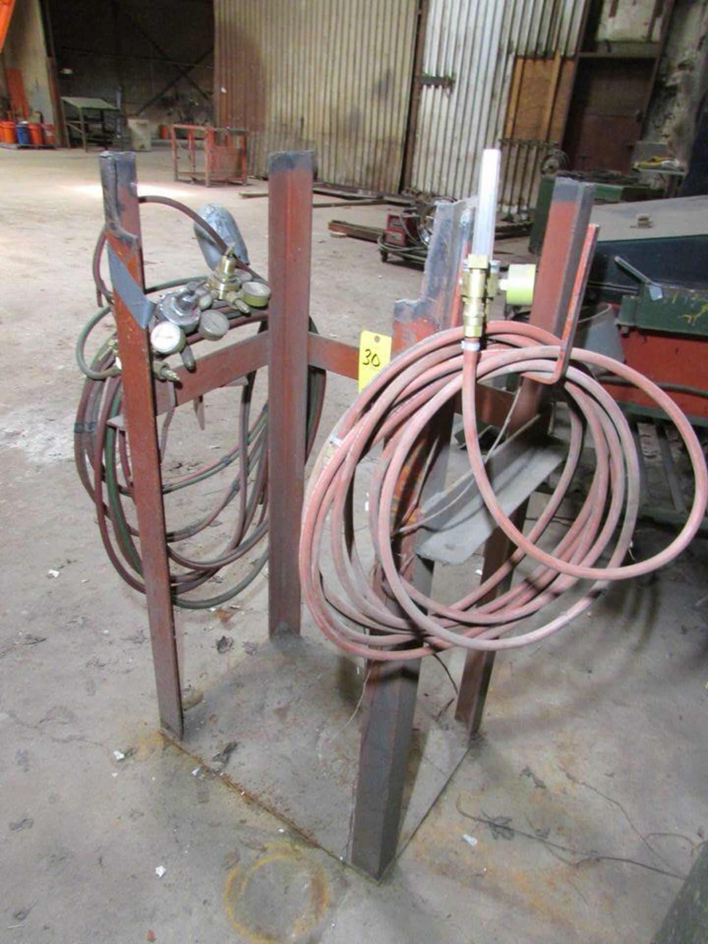 (2) Oxy Acetylene Cylinder Torch Racks; With Torch Hose, (7) Pressure Regulators and (4) Torches (