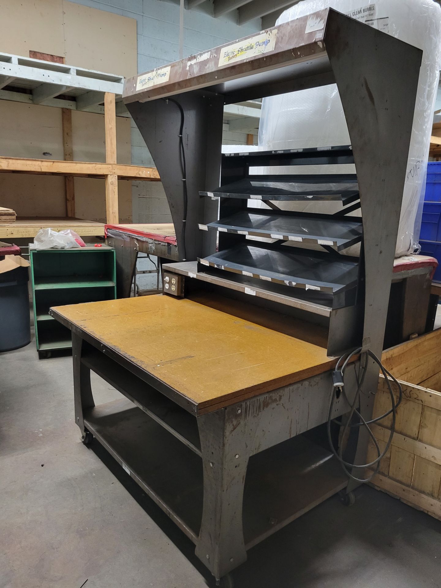 (1) Lighted Work Station. DIMS 3'1" deep x 4' wide x 6' high. Metal construction, Wood Working