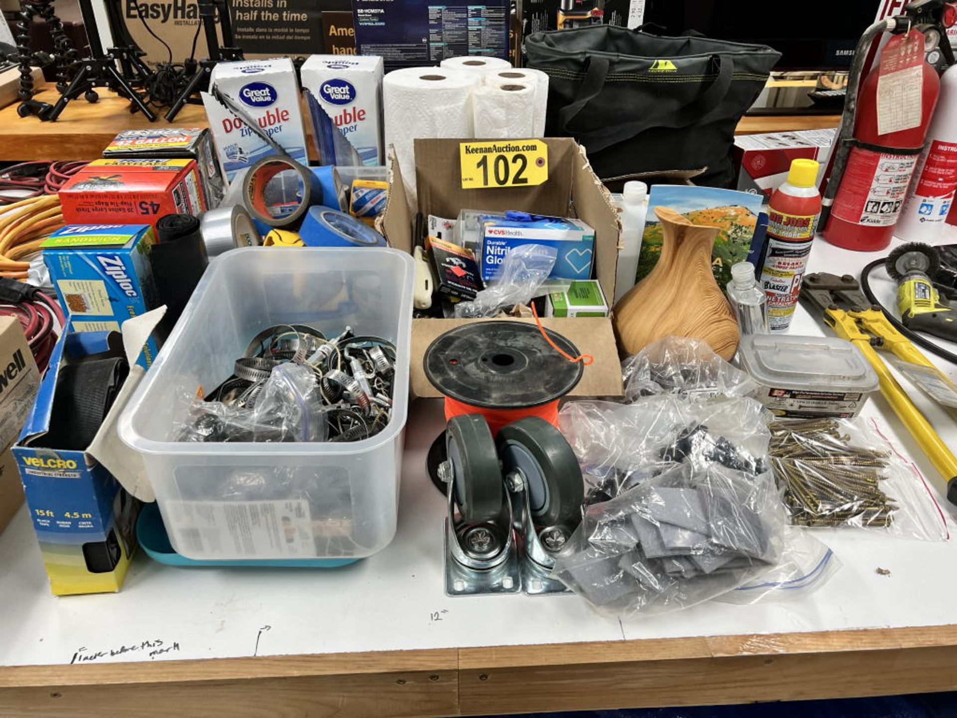 MISCELLANEOUS LOT: PLASTIC BAGS, COOLER BAG, CASTERS, PIPE CLAMPS, TAPE, VELCRO, SCREWS, PAPER TOWEL