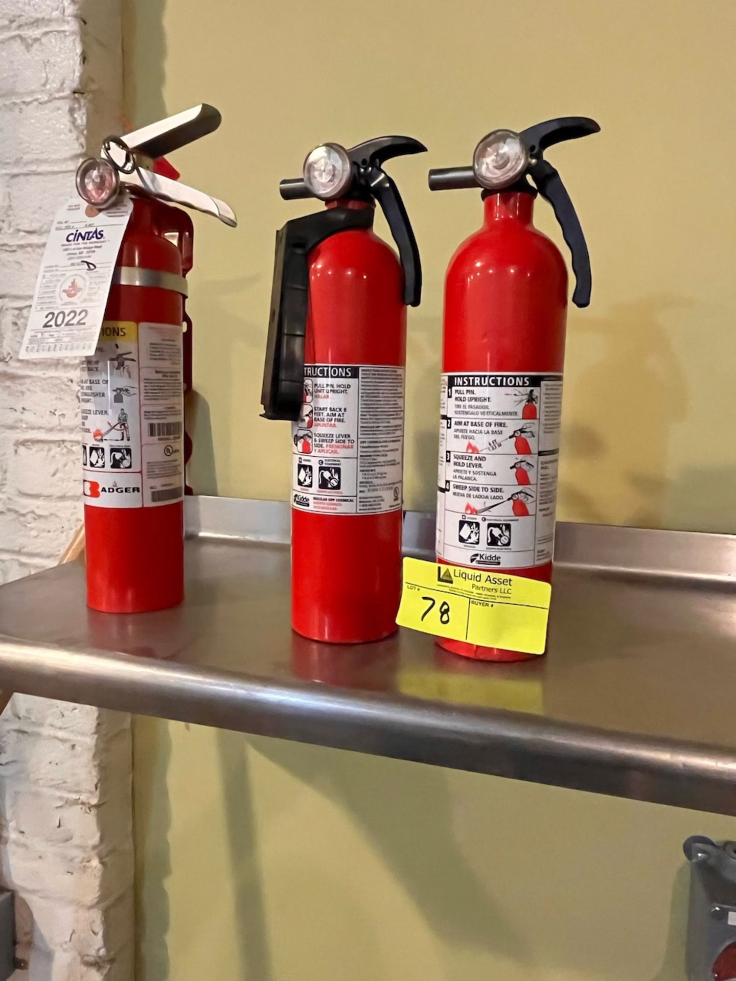 3 small fire extinguishers