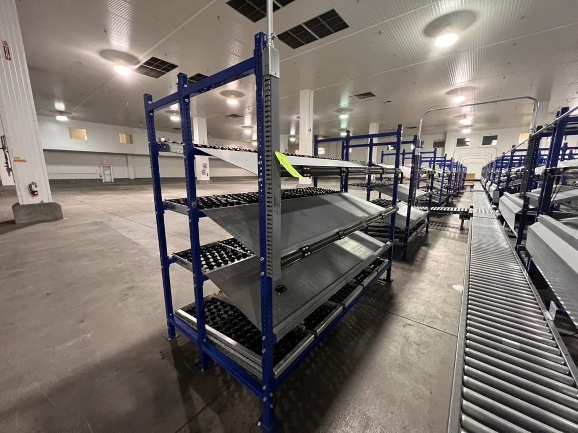 (2) UNEX SPAN TRACK PRODUCT PACK-OFF RACKS, WITH ROLLER CONVEYOR (SUBJECT TO BULK BID IN LOT 11A)