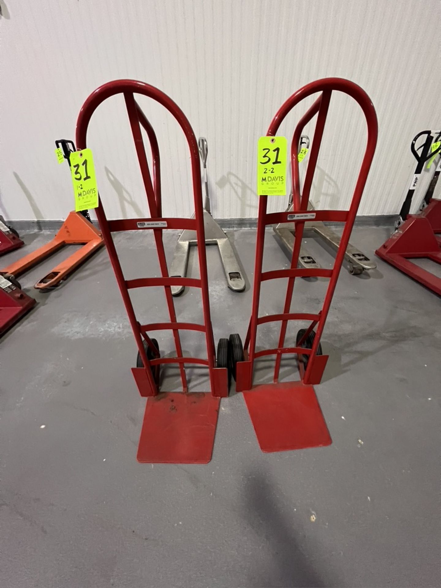 (2) ULINE STEEL HAND TRUCKS (RIGGING & SIMPLE LOADING FEE $25.00) (NOTE: DOES NOT INCLUDE SKIDDING
