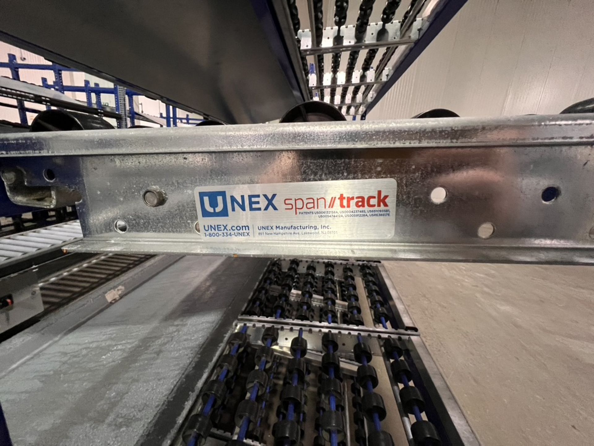 (2) UNEX SPAN TRACK PRODUCT PACK-OFF RACKS, WITH ROLLER CONVEYOR (SUBJECT TO BULK BID IN LOT 11A) - Image 5 of 6