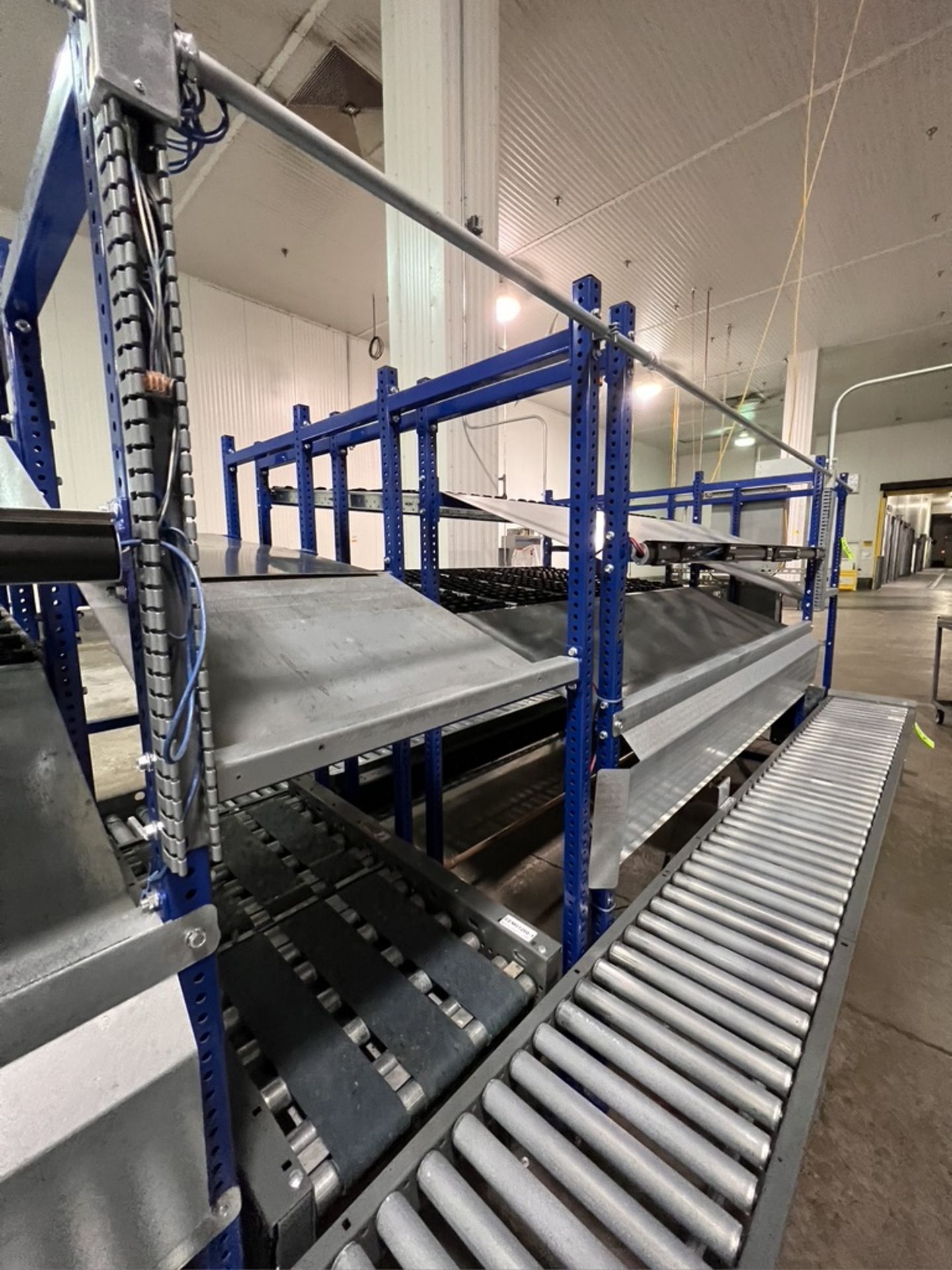 (2) UNEX SPAN TRACK PRODUCT PACK-OFF RACKS, WITH ROLLER CONVEYOR, INCLUDES SINGLE DOOR CONTROL PANEL - Image 7 of 18