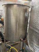 Used approximately 230 gallon stainless steel vertical tank. Approximately 38" diameter X 48"