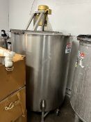 Used approximately 500 gallon stainless steel vertical tank. Approximately 52" diameter X 57"