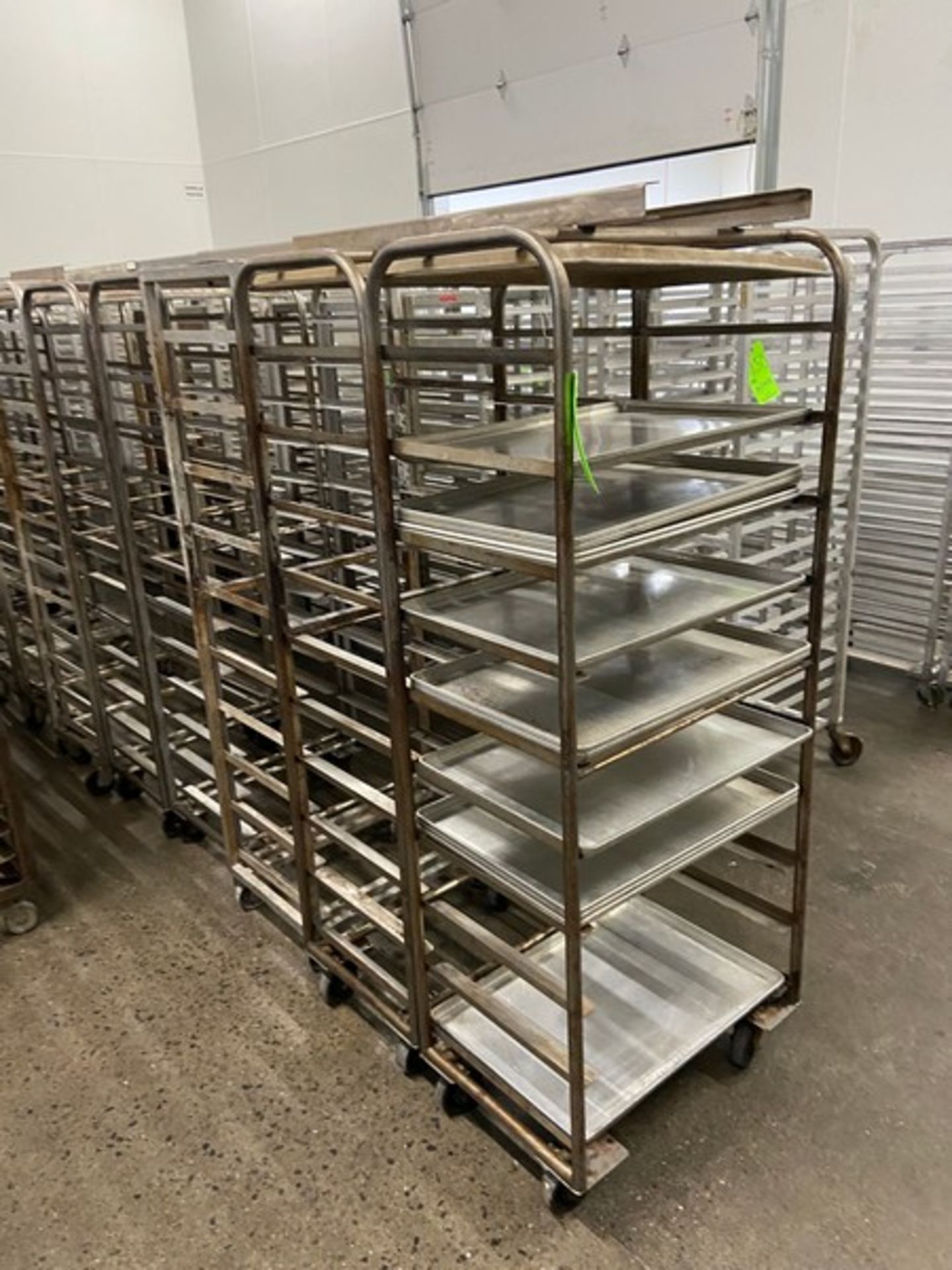 (20) BAKING PAN RACKS, MOUNTED ON CASTERS (LOCATED IN CALLERY, PA)