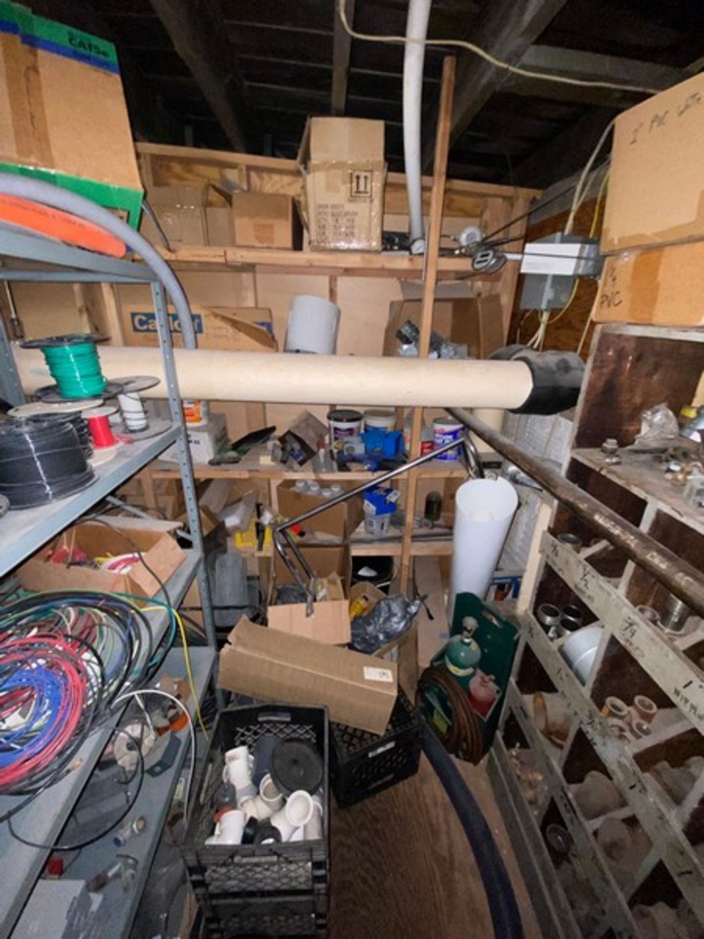 CONTENTS OF MIDDLE SHELVING UNITS, INCLUDES BELTS, ASSORTED ELECTRICAL PLUGS, LIGHT PROTECTION UNITS - Image 7 of 7