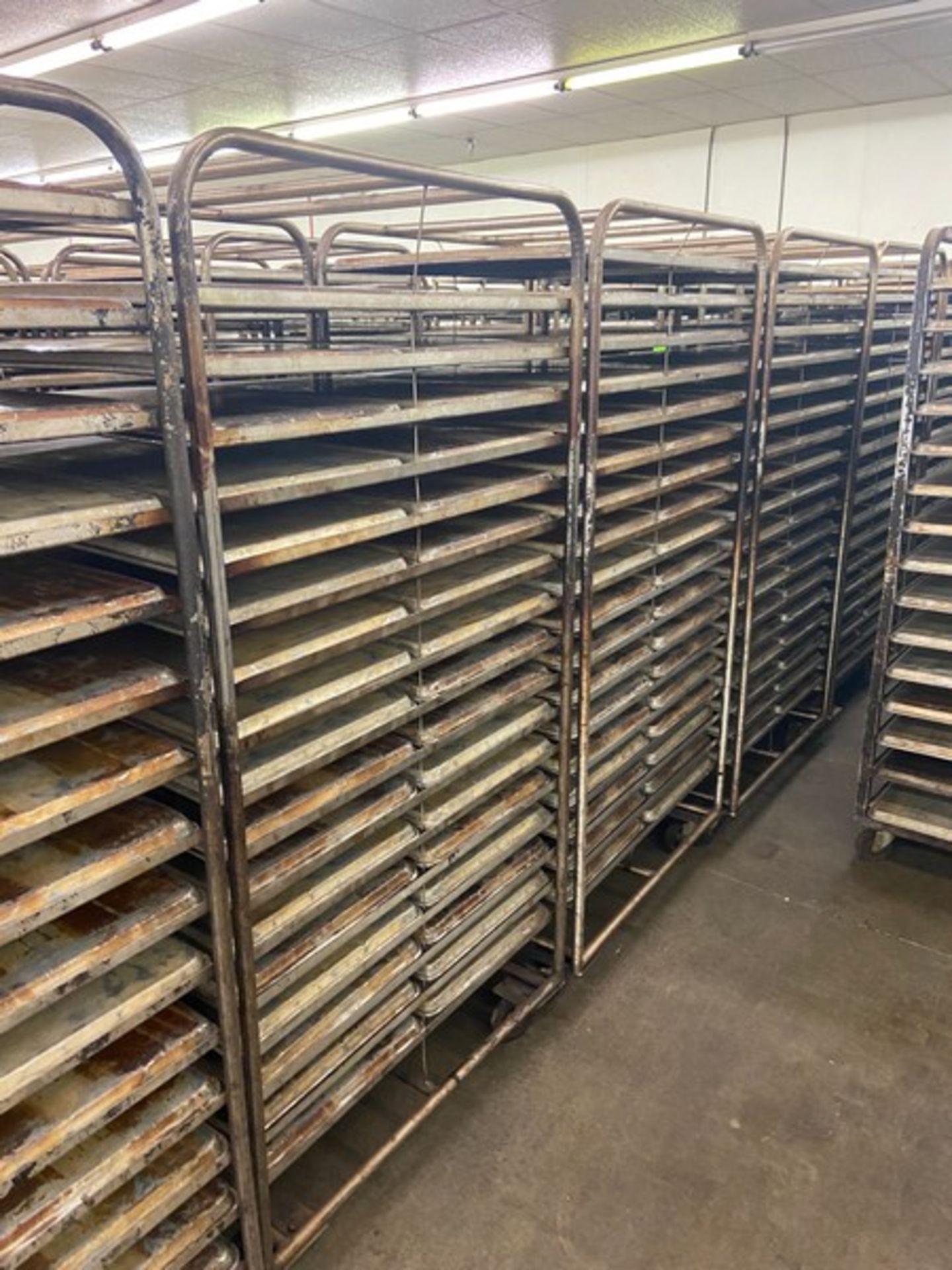 (9) PORTABLE DOUBLE SIDED BAKING PAN RACKS, MOUNTED ON CASTERS (LOCATED IN HERMITAGE, PA) - Image 3 of 4