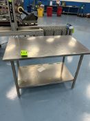 STAINLESS STEEL TOP AND UNDERSHELF DIMENSIONS APPOXIMATELY 48" L 30" W 34" H