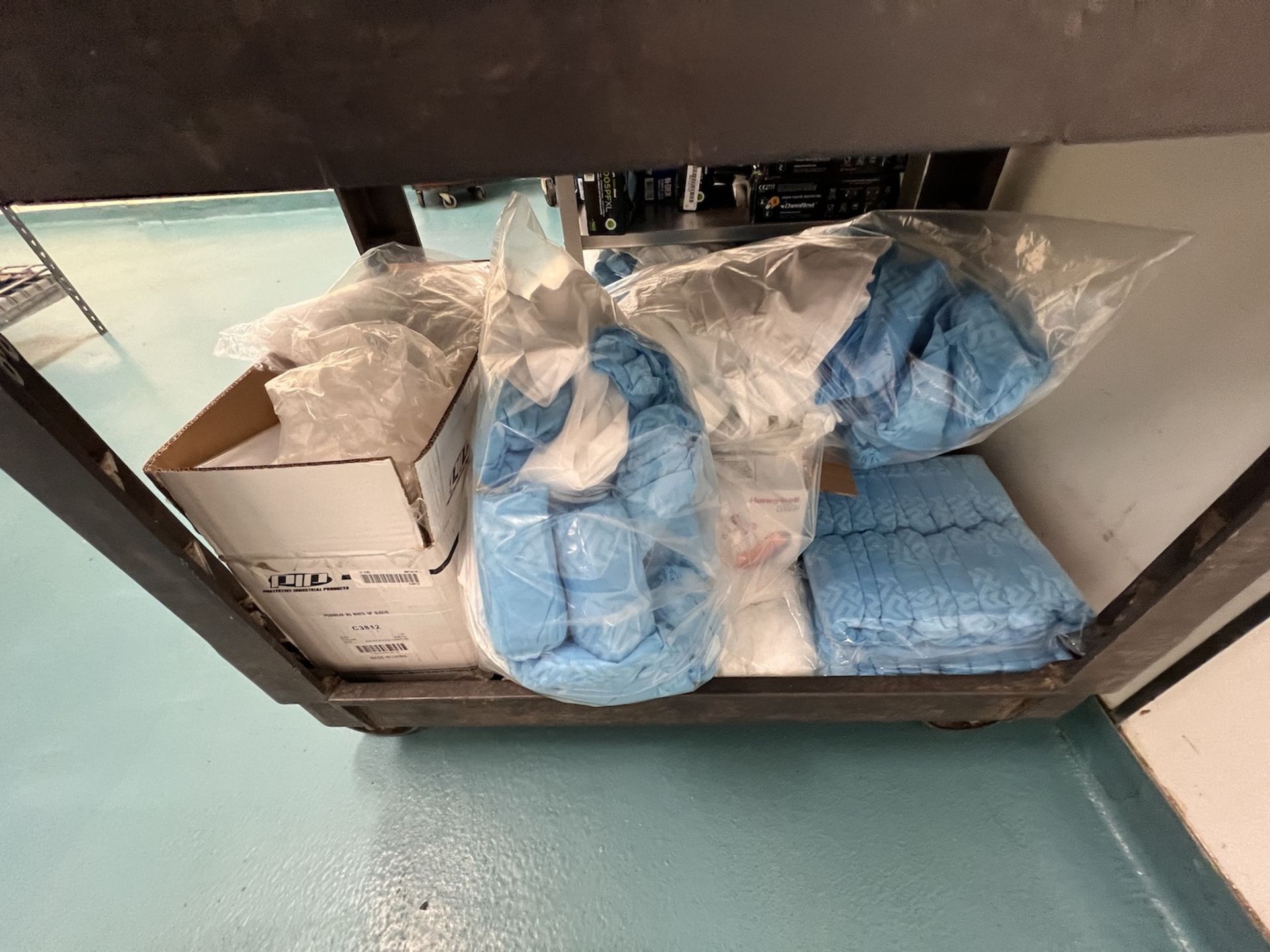 ASSORTED PPE AND SANITARY SUPPLIES, INCLUDES RUBBER GLOVES, COVERALLS AND MORE (CONTENTS ON CARTS. - Image 10 of 11