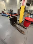 RAYMOND ELECTRIC WALK-BEHIND PALLET JACK, MODEL 8210, S/N 821-16-12011, 24 V(SOLD SUBJECT TO CONFIR