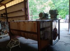 Aprox. 100 cu.ft. S/S Double Ribbon Blender with 15 hp motor and drive. The blender is being