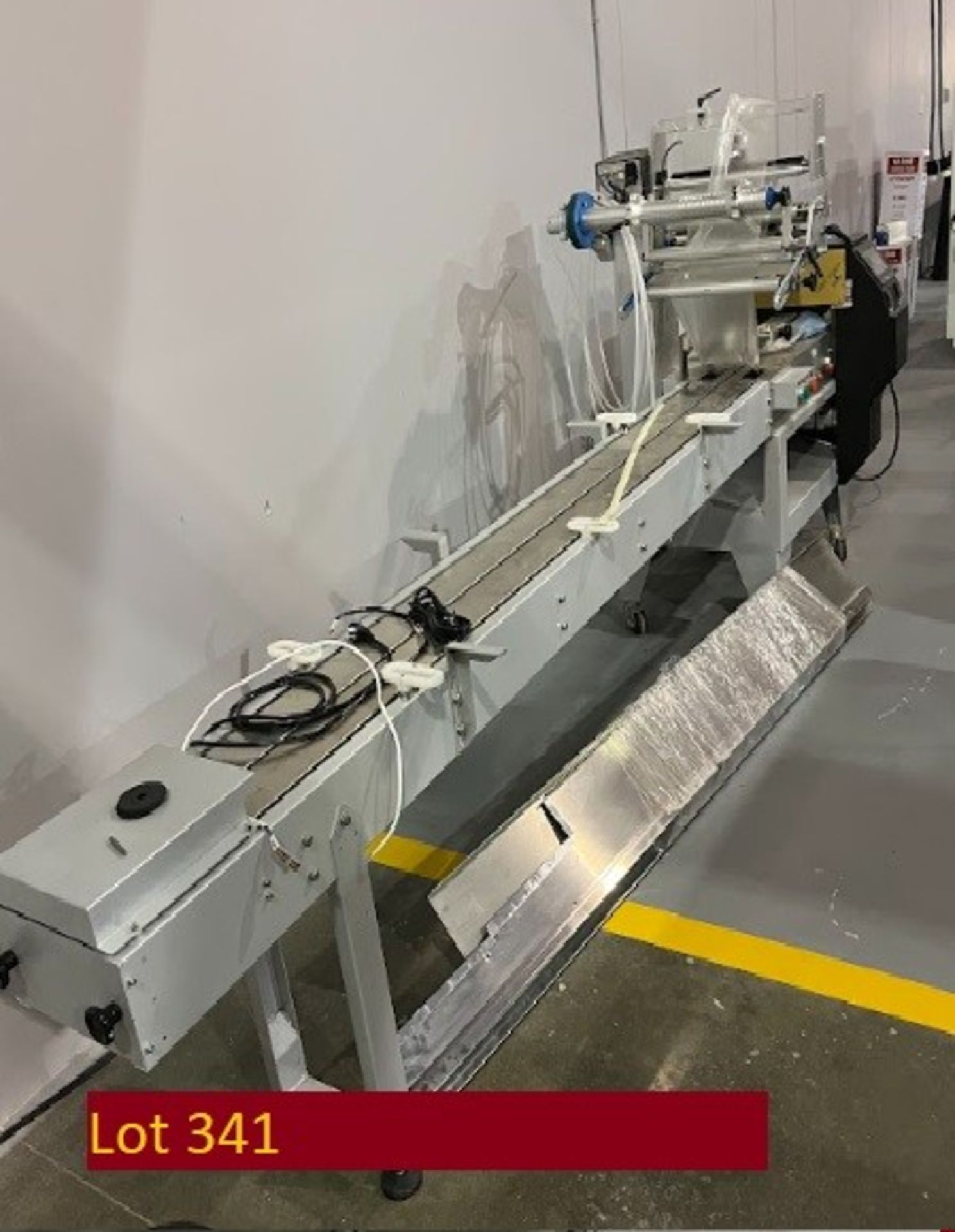 3 Ply over wrapper machine - Suny (Loading Fee $50) (Located Collinsville, IL)