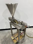 Stainless Steel Piston Filler. This is a pneumatic driven piston Filler. Video available per