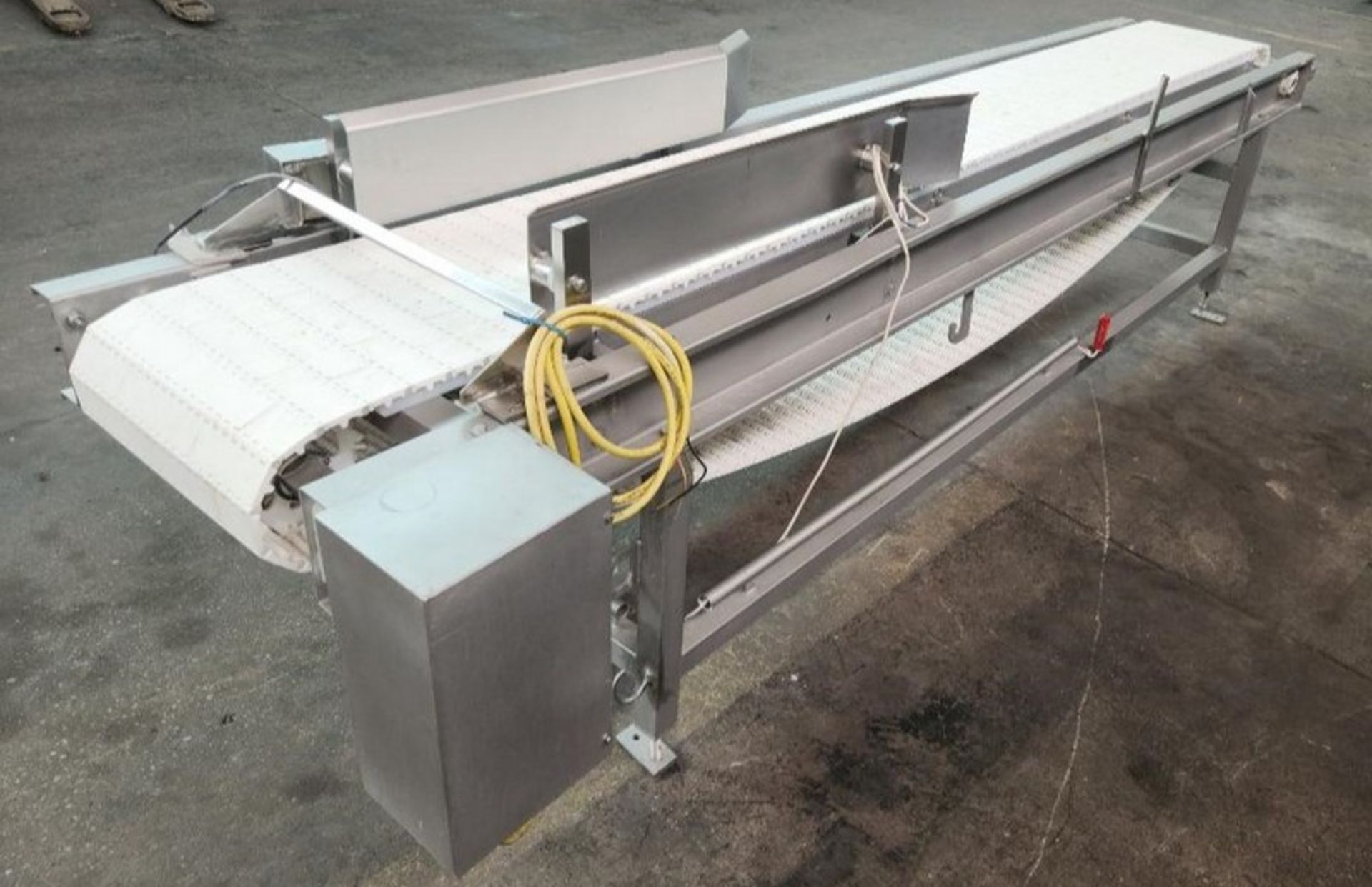 Aprox. 15" 126" L White Intralox Belt Conveyor with 32" Infeed and Discharge Height. Infeed and