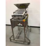 ProQuip tablet sizer. This is a 4 lane unit in operating condition. As shown in photos. Video