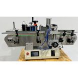 Winskys ST-530 Wraparound Labeler. Machines features the following: Labeling Accuracy: +- .5mm,