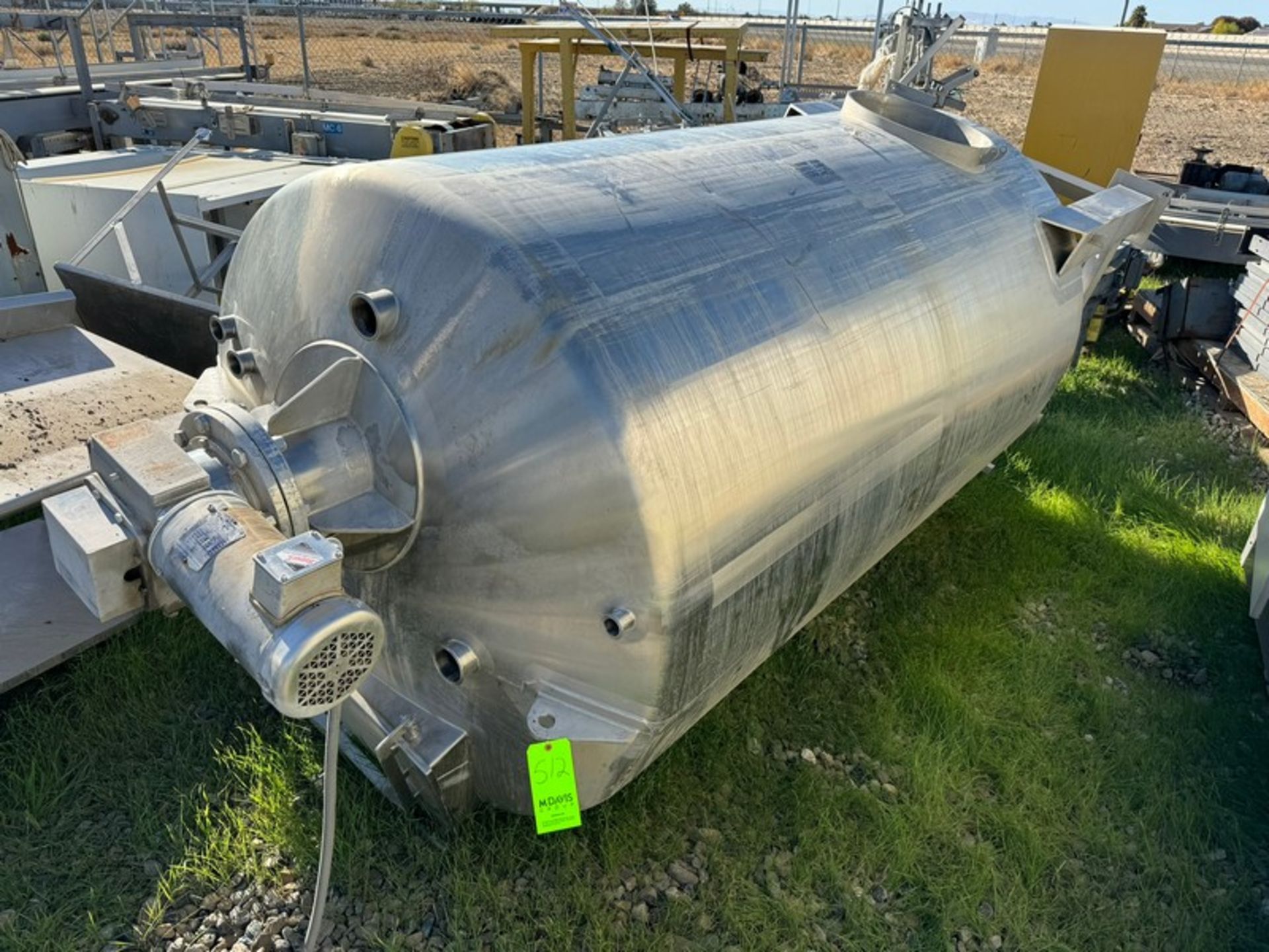Aprox. 1,500 Gal. S/S Single Wall Vertical Tank, with Vertical S/S Agitation, with Aprox. 2” Clamp T