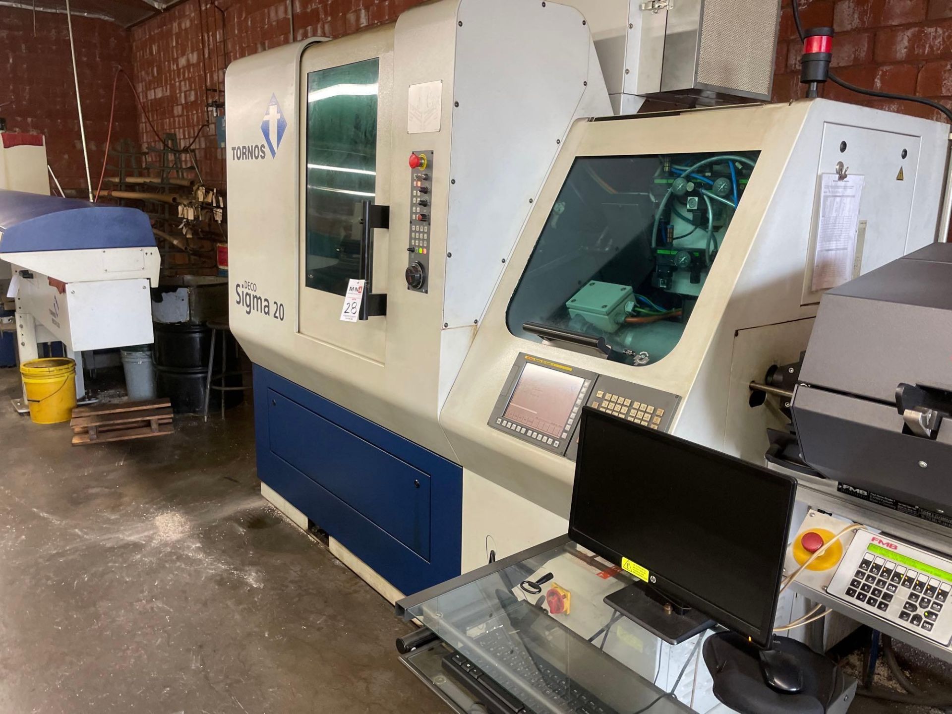 Tornos DECO SIGMA 20 CNC Swiss Style Screw Machine, GE Fanuc 31i Ctrl., Live Tooling, New 2006