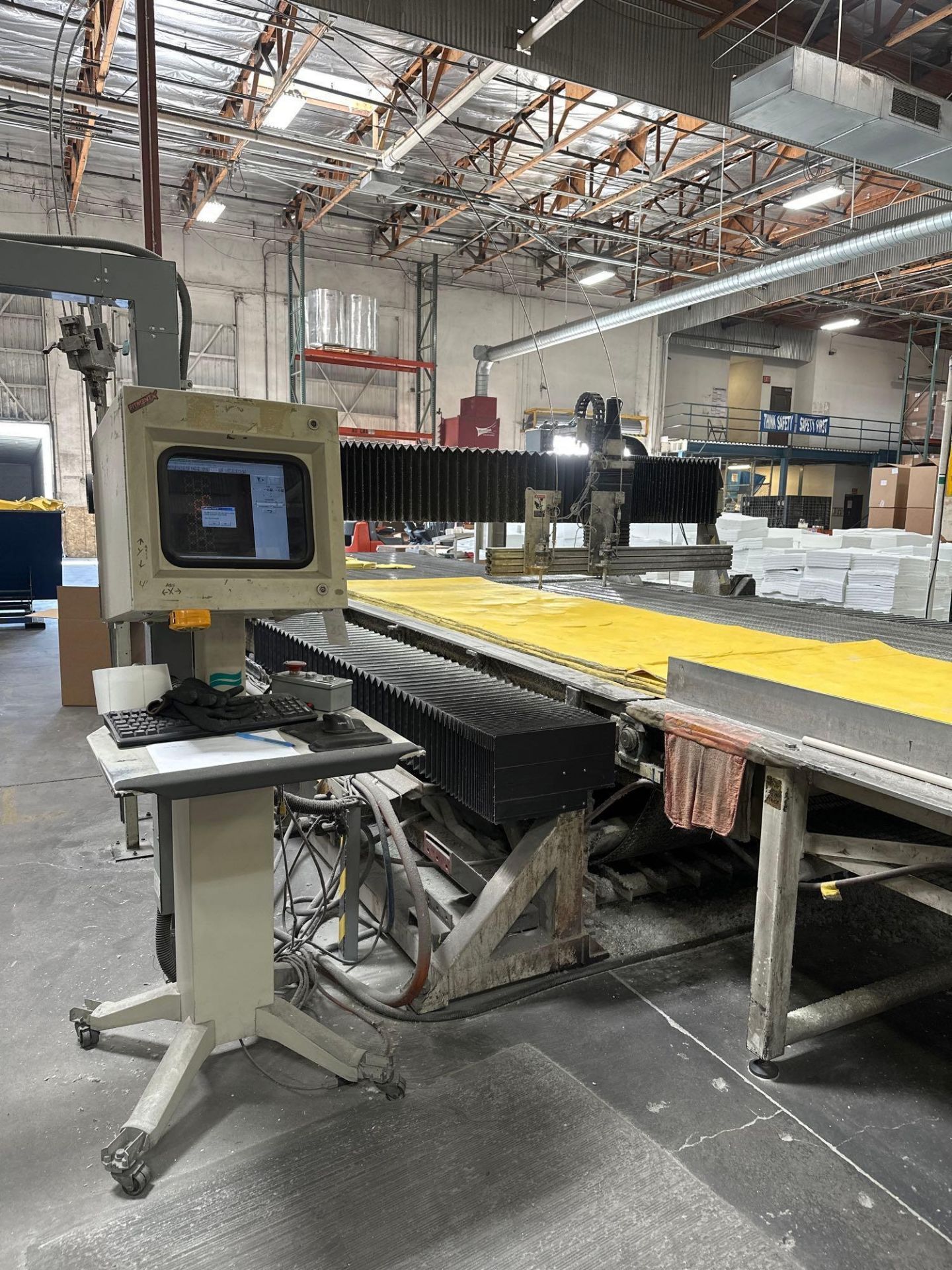 Flow Series A 8' x 12' Waterjet w/ Thru Feed Conveyor, XSE-55 Pump, 7X 55K PSI Intensifier, New 2000