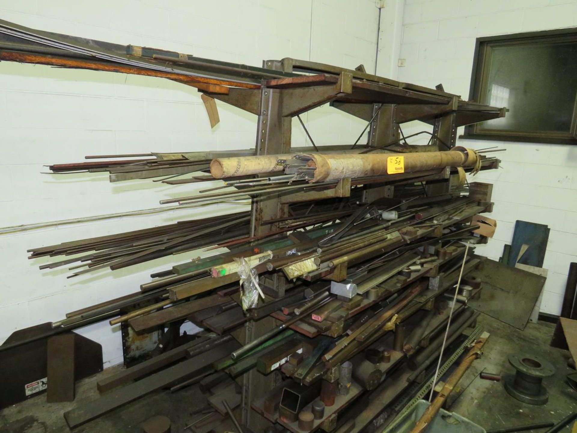 LOT OF MATERIAL RACK WITH CONTENTS