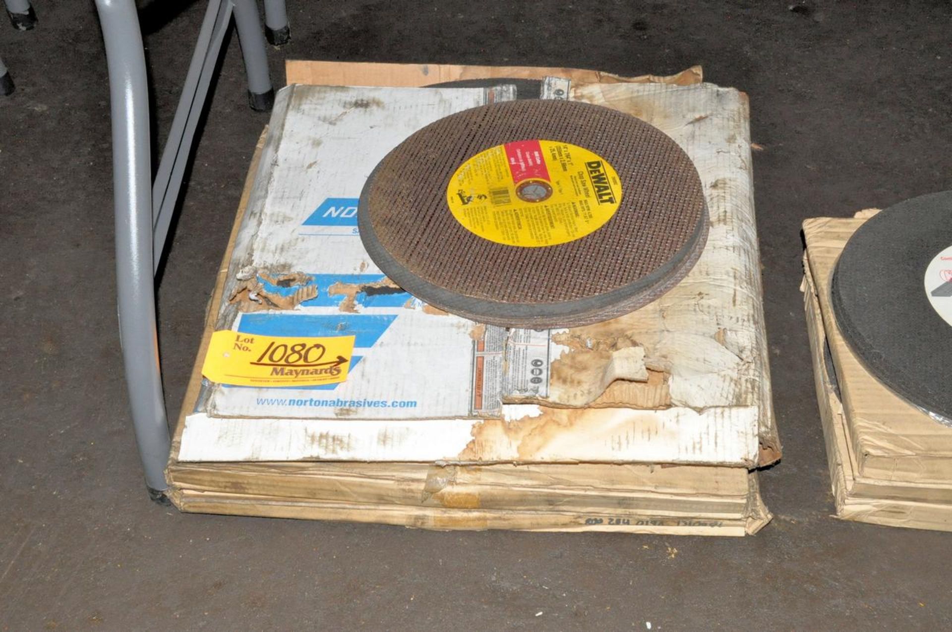 Lot of Abrasive Cutoff Wheels in (3) Stacks Under (1) Table - Image 2 of 4