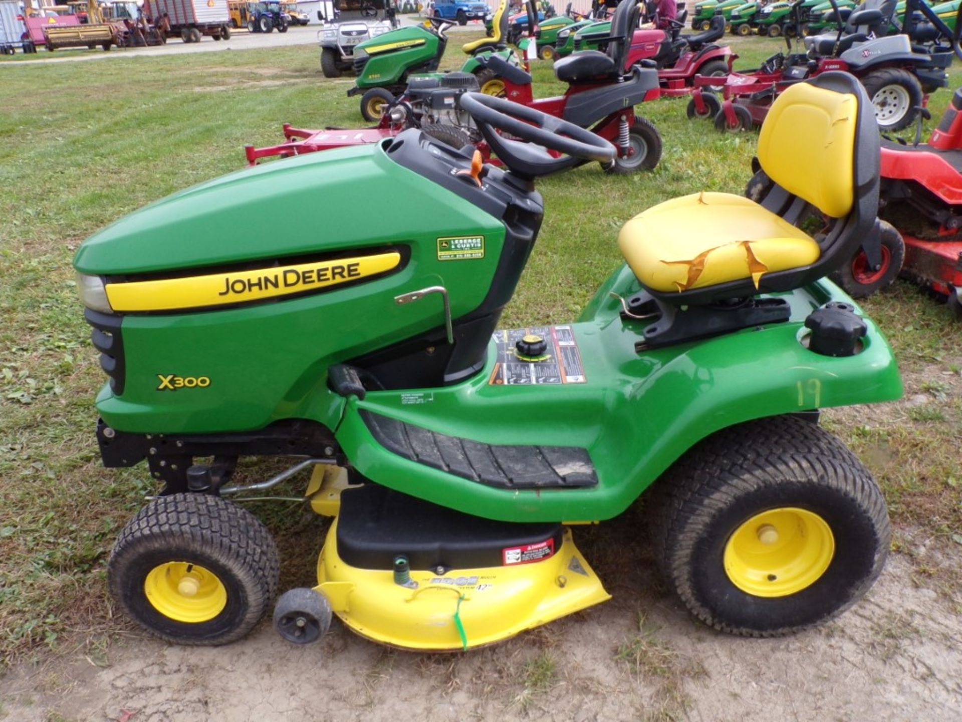 John Deere X300 Riding Mower w/42'' Deck, Kawasaki Engine, Has JD 44'' Snow Blower, 278 Hours,