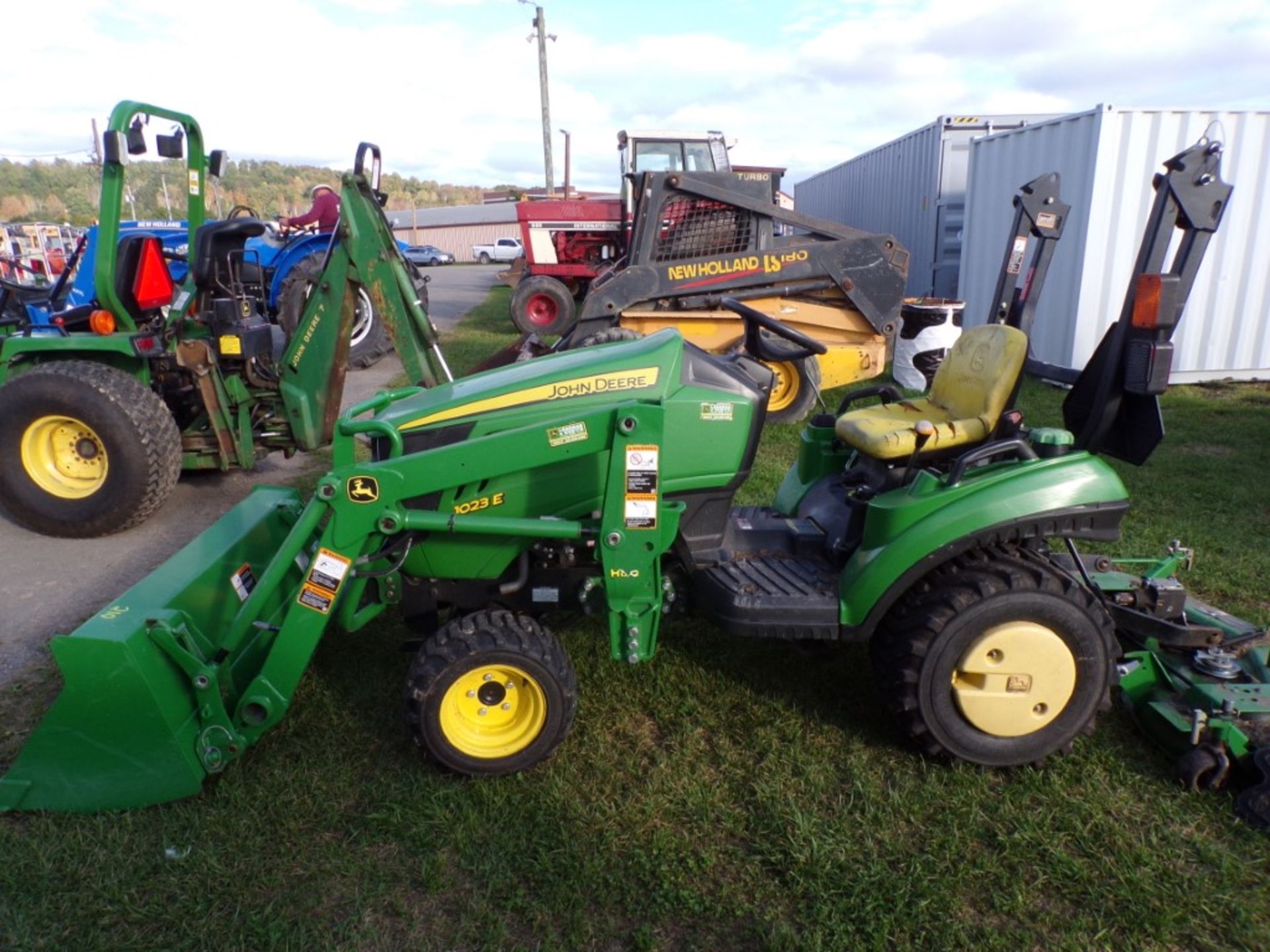 JD 1023 E 4WD Subcompact Tractor w/Loader and 54'' Drive Over Deck, Hydro, 493 Hrs, S/N - 310390 (