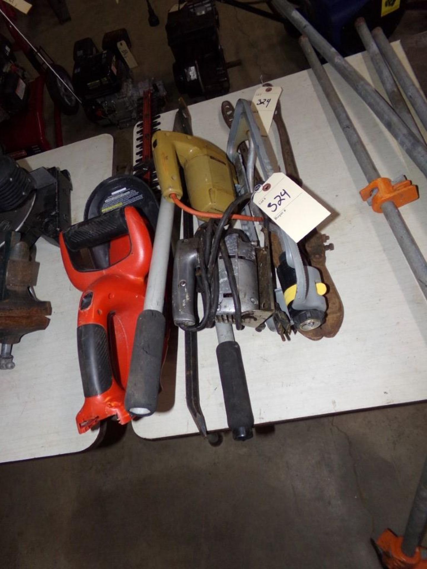 Batterry Hedge Trimmer (NO BATTERY), (2) Jigsaws, Sprinkler, Old Bolt Cutter, Pruner and Crow Bar