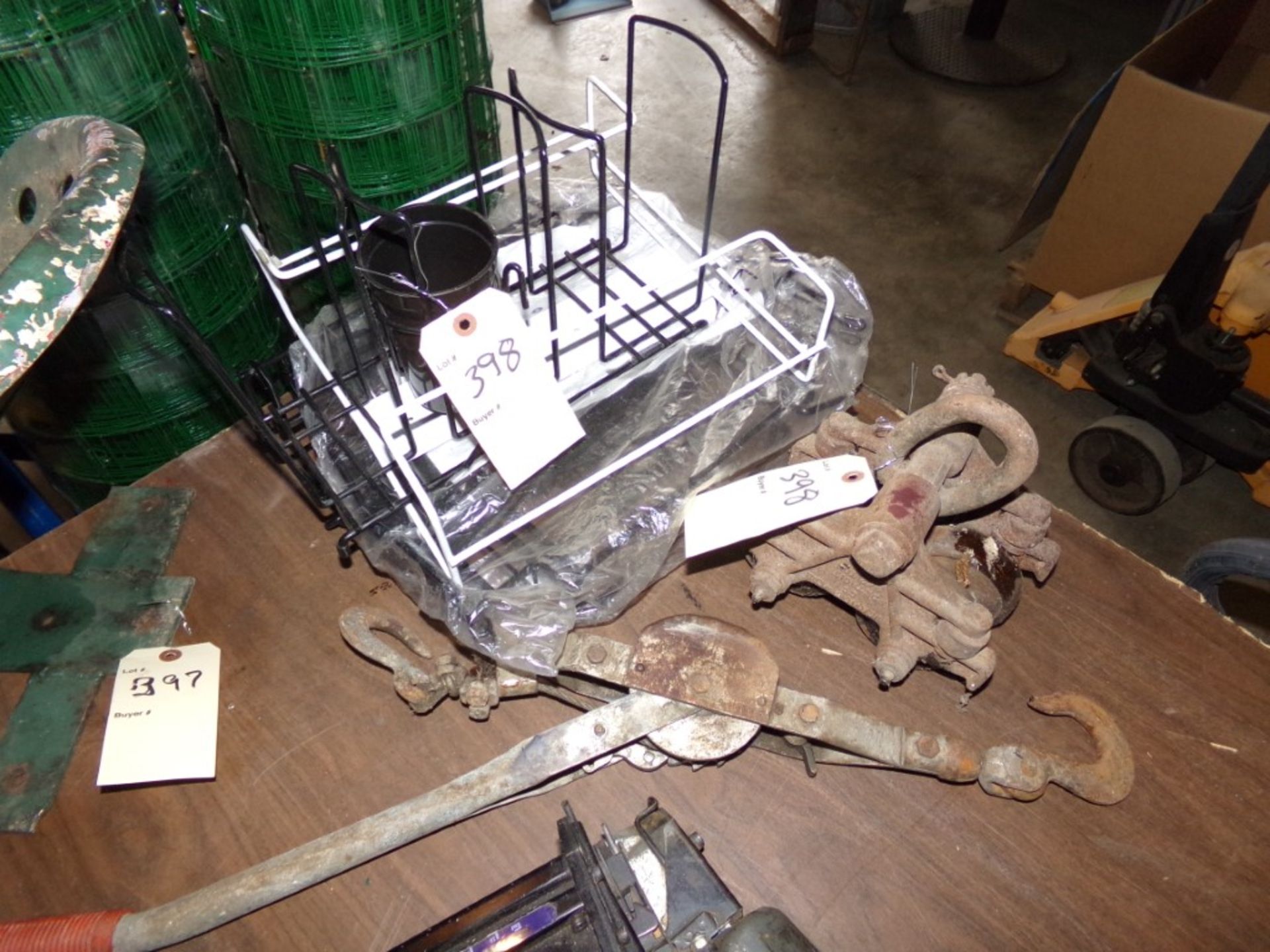 Old Come Along Cable Hoist, an Antique Trolley and Group of Wire Rack for Store Display Shelves