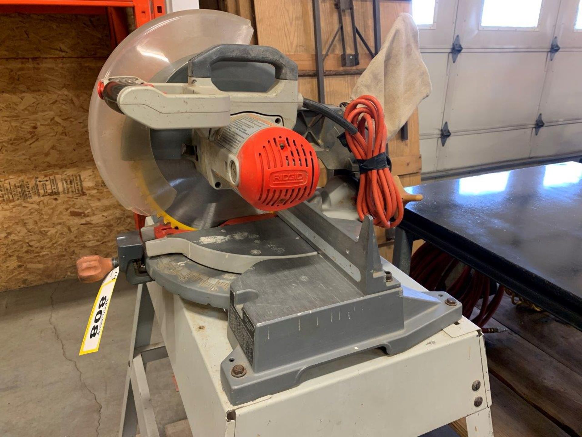 RIDGID 12" MITRE SAW ON STAND W/ ASSORTED BLADES - Image 3 of 5