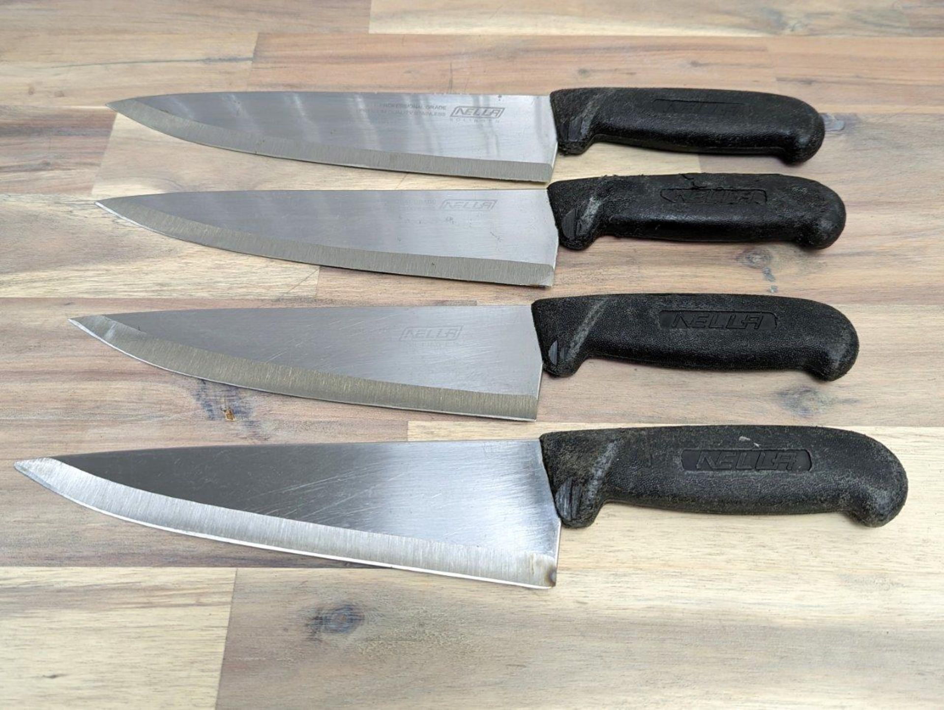 USED, SHARPENED COOK KNIVES, BLACK HANDLES - LOT OF 4