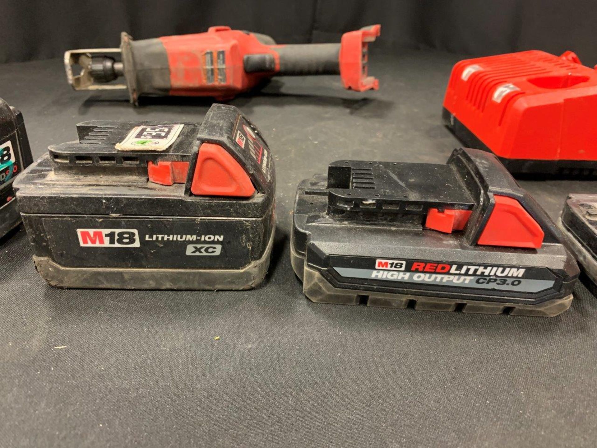 MILWAUKEE CORDLESS HACKSAW ASSORTED BATTERIES AND CHARGER - A40 - Image 12 of 14