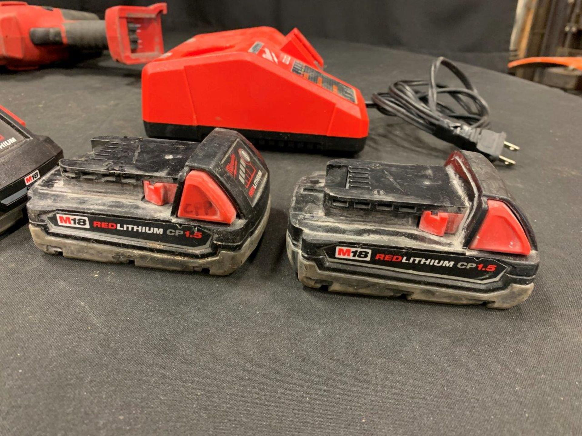 MILWAUKEE CORDLESS HACKSAW ASSORTED BATTERIES AND CHARGER - A40 - Image 11 of 14