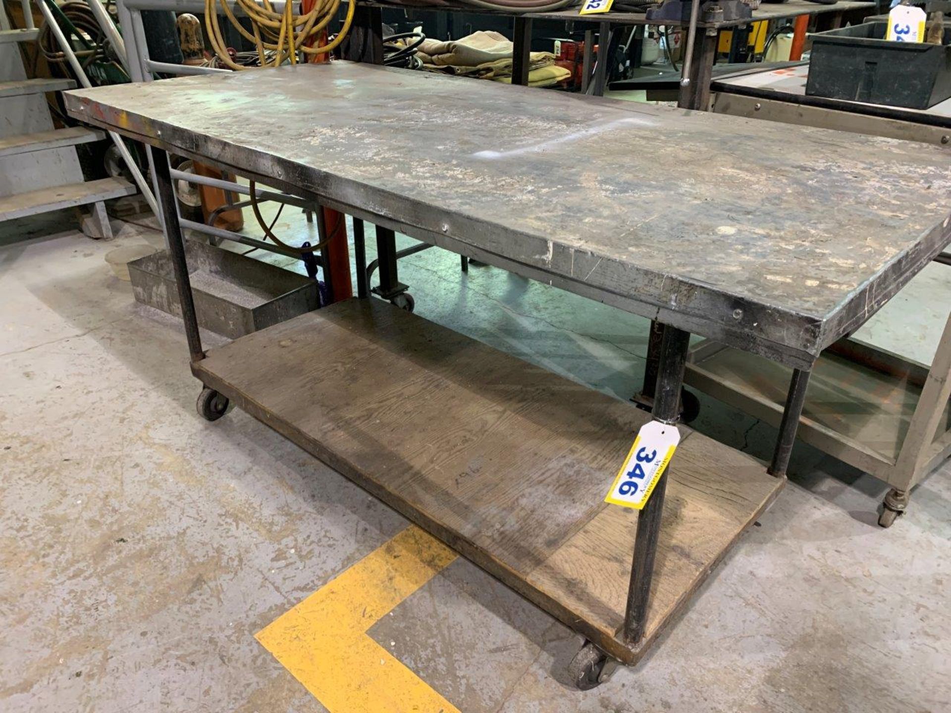 STEEL WORK TABLE CON CASTERS 33"X72"X35"H